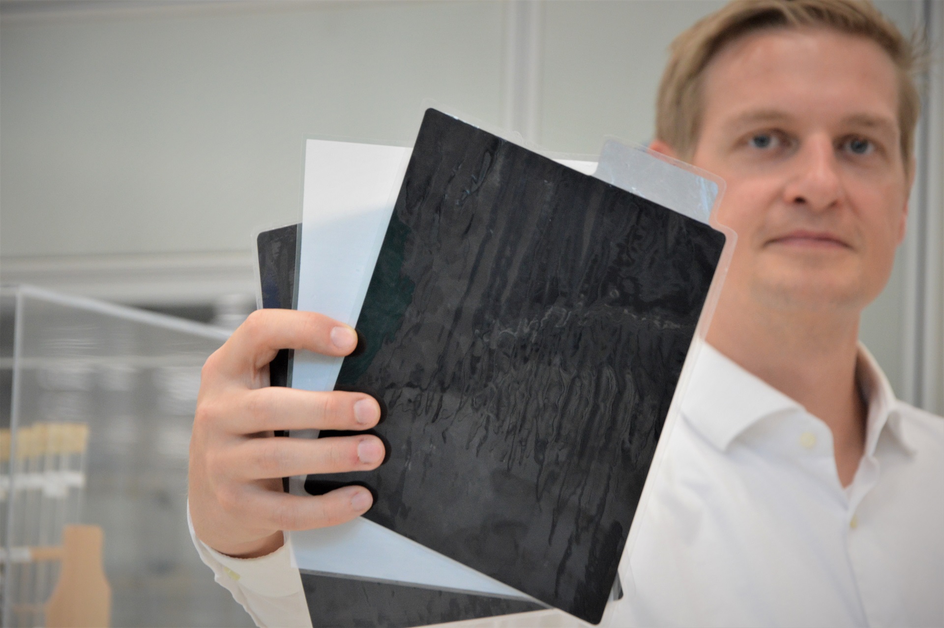 The future of battery research in one hand: Christoph Berger with electrode foils, the basic components of a battery. 